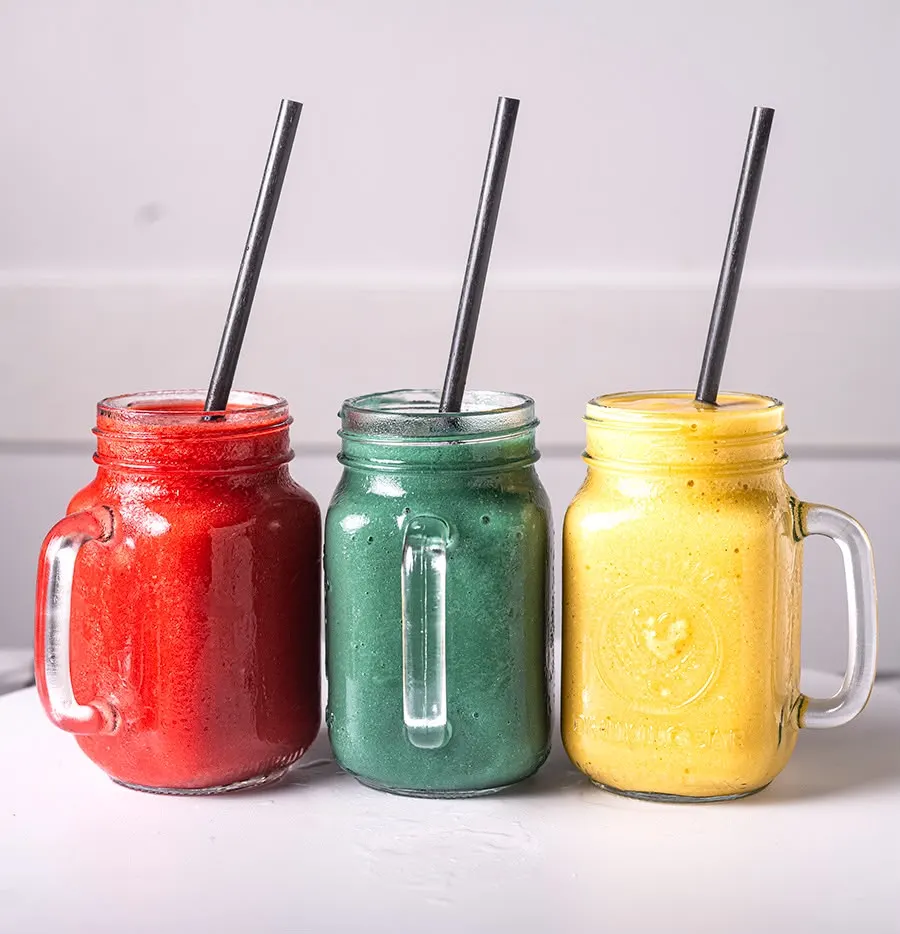 Three NRG smoothies in mason jars